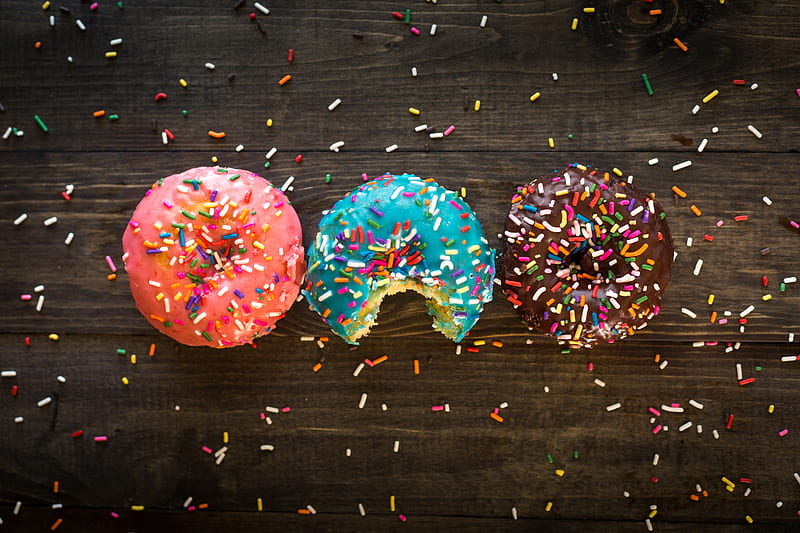 pink, blue, and chocolate with sprinkles doughnuts on table, HD wallpaper