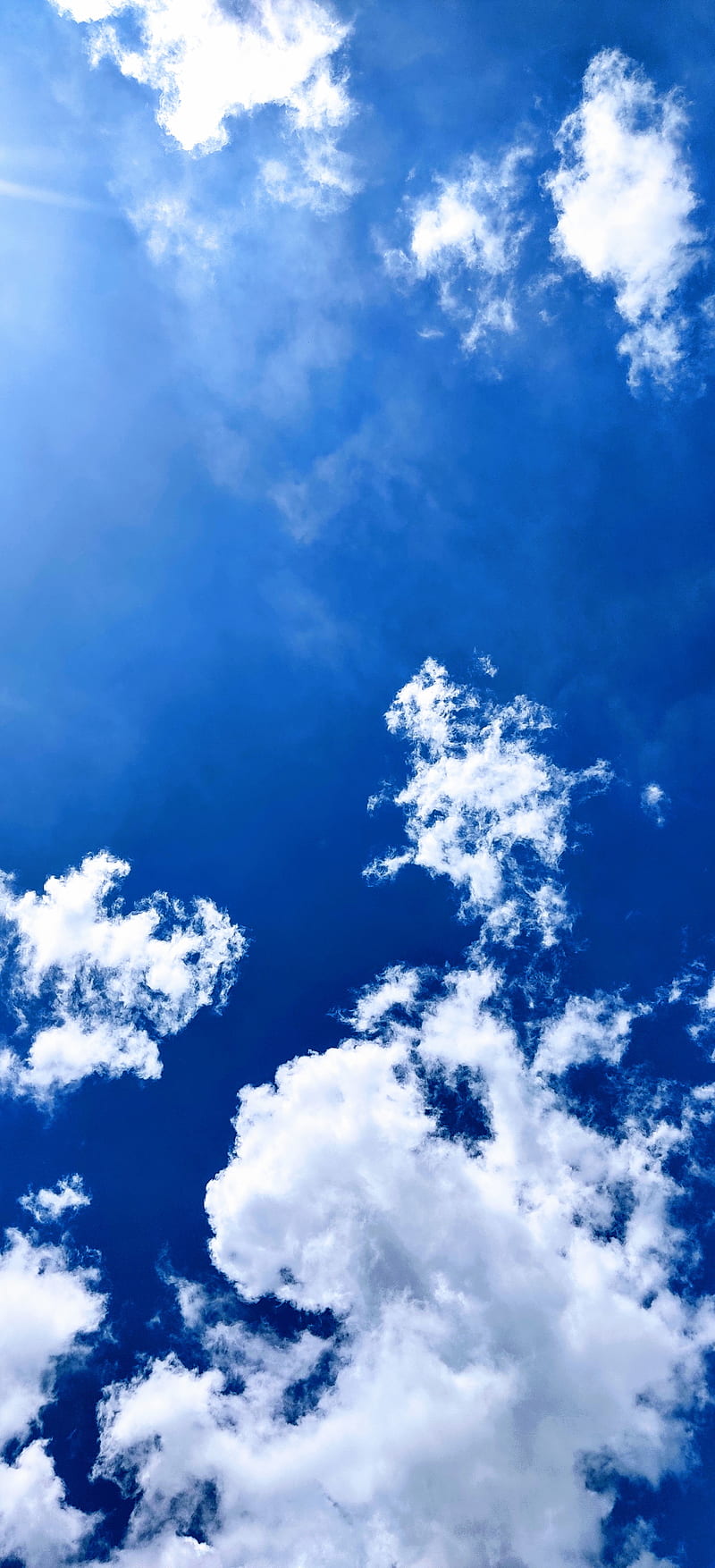 white clouds and blue sky during daytime iPhone 11 Wallpapers Free Download