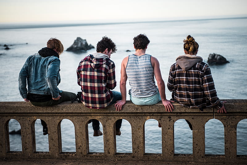 four person sitting on bench in front of body of water, HD wallpaper