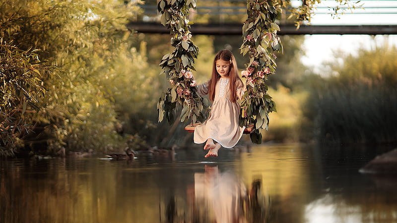 Cute Little Girl Is Sitting On Flower Swing Above Body Of Water With Reflection Cute, HD wallpaper
