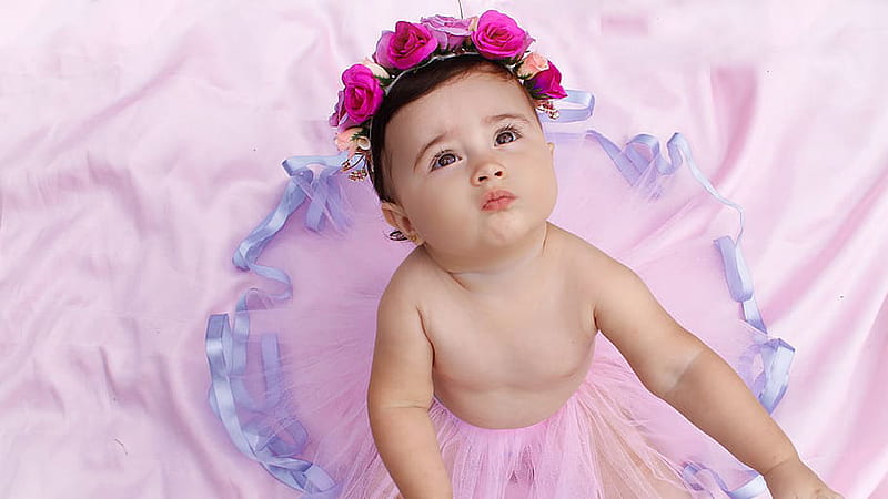 Cute Adorable Girl Baby Is Looking Up Wearing Purple Dress Cute