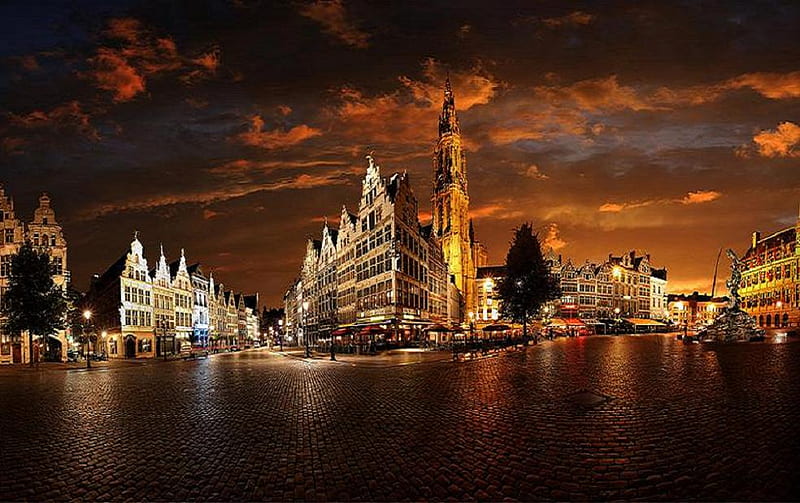 Belgium city at night, golden cloudy sky, lovely, buildings, trees, skyscrapers, antwerpen, belgium, city, towers, skyline, reflections, cobble streets, night, HD wallpaper