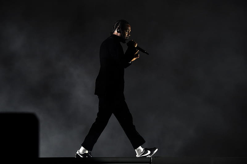 Download Kendrick Lamar In City Landscape Wallpaper