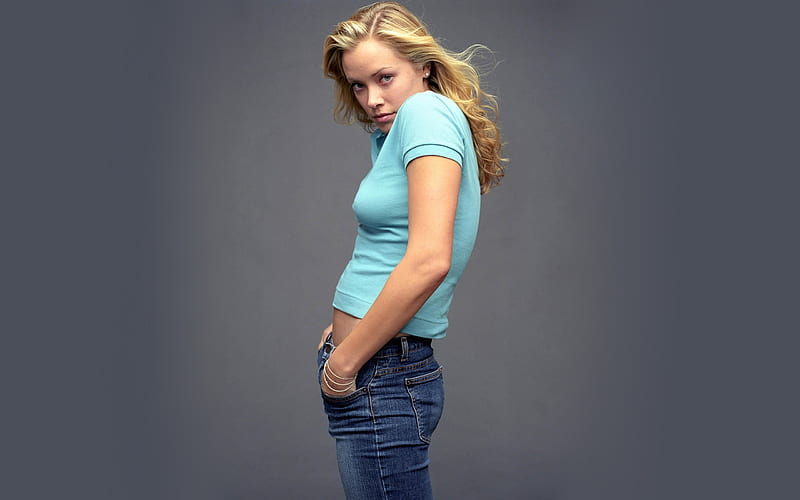 Kristanna Loken, jeans, actress, hands in pocket, blonde, gray background, HD wallpaper