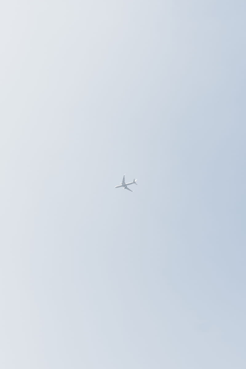 From below of modern passenger aircraft flying high in cloudless sky over ground, HD phone wallpaper