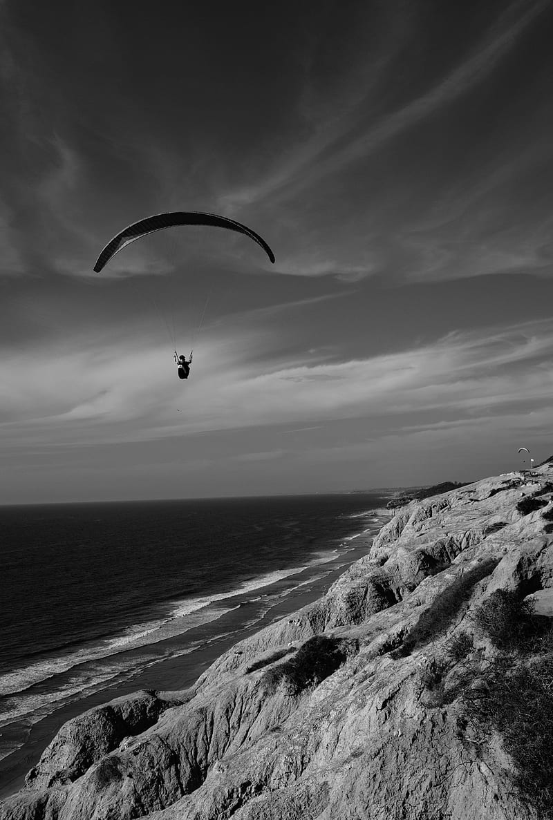 skydiver, ocean, coast, black and white, HD phone wallpaper