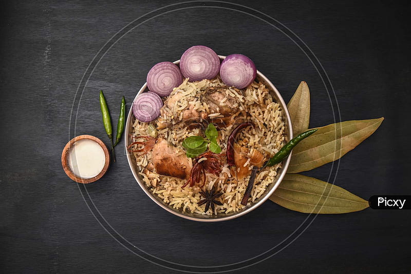 Of Delicious Chicken Biryani Top View.Biryani Rice Dish Beautiful Indian Rice Licious Spicy Chicken Biryani In Bowl Over Moody Background, It's A Popular Indian And Pakistani Food. PH628391 Picxy, HD wallpaper