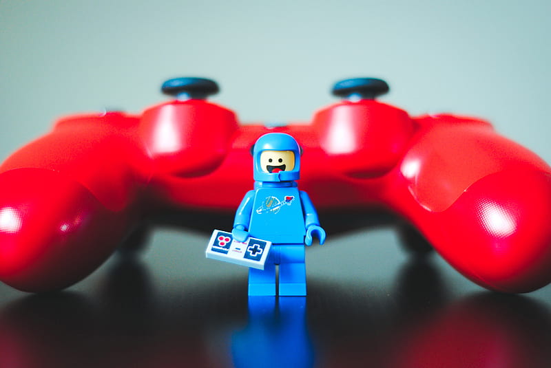 blue lego toy beside red game controller, HD wallpaper