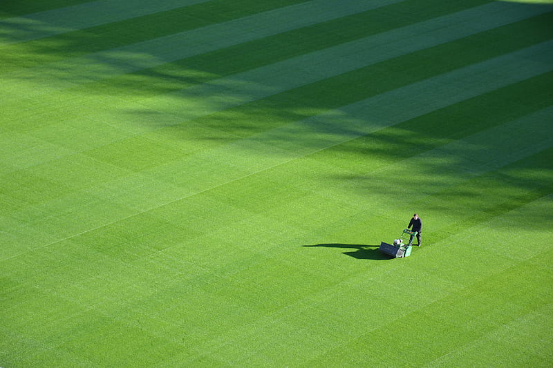 aerial graphy of person trimming sports field during day, HD wallpaper