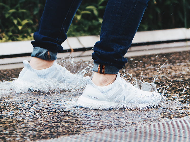 person wearing pair of gray adidas UltraBOOST low-top sneakers stepped on pool of water, HD wallpaper