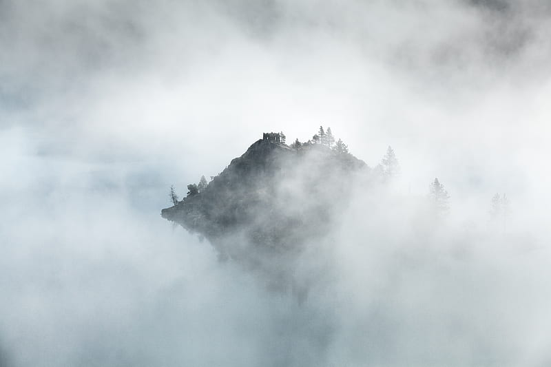 Mountain peak in Emerald Bay peeks through morning mist, HD wallpaper