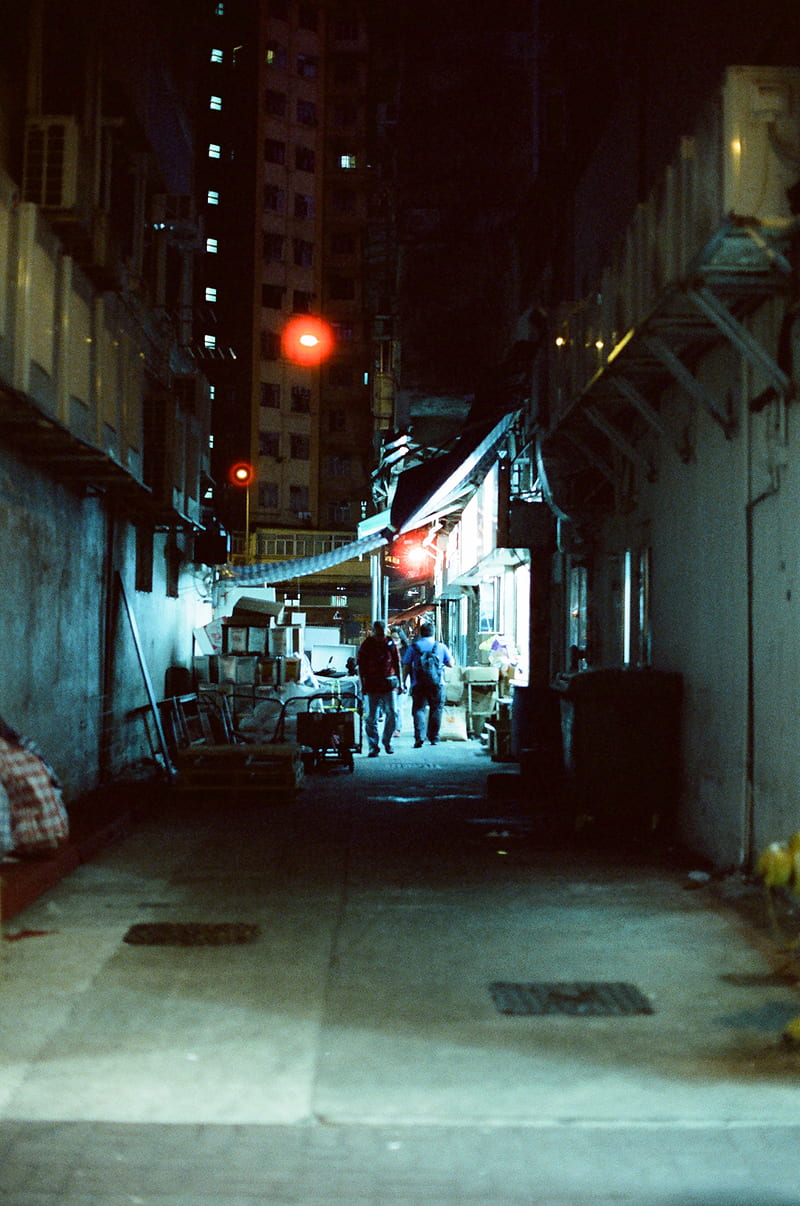 two men walking along narrow road between buildings, HD phone wallpaper