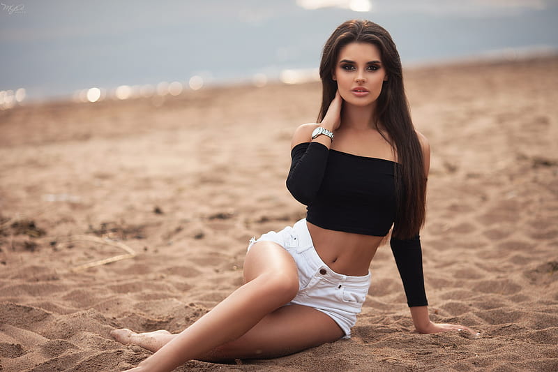 Beautiful Brunette Girl Sitting On Sand, girls, model, brunette, sand, beach, outdoors, depth-of-field, HD wallpaper