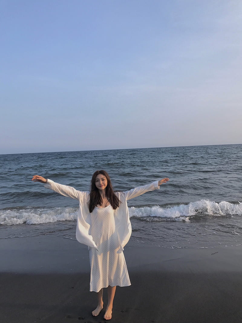 Chinese, Duebass, arms up, standing, barefoot, white clothing, smiling, long hair, looking at viewer, beach, sea, women outdoors, HD phone wallpaper
