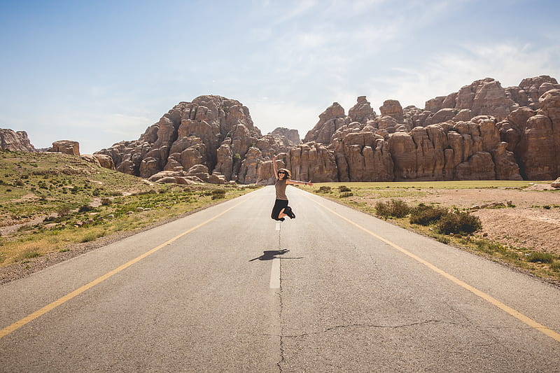 woman jumping on the middle of road, HD wallpaper