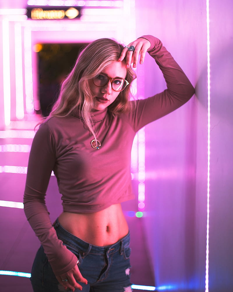 Carly Belle, blonde, women, model, belly, torn jeans, turtlenecks, painted nails, necklace, women with glasses, looking at viewer, neon lights, women indoors, portrait, nose rings, pink, HD phone wallpaper