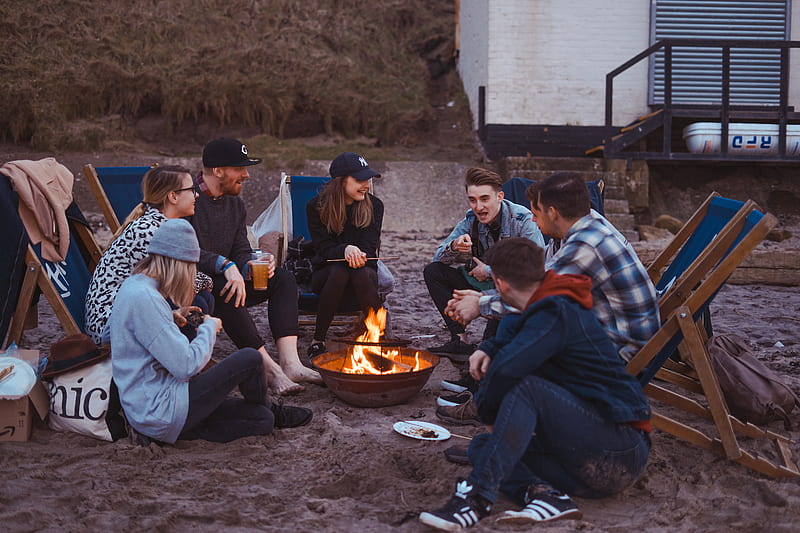 group of people sitting on front firepit, HD wallpaper