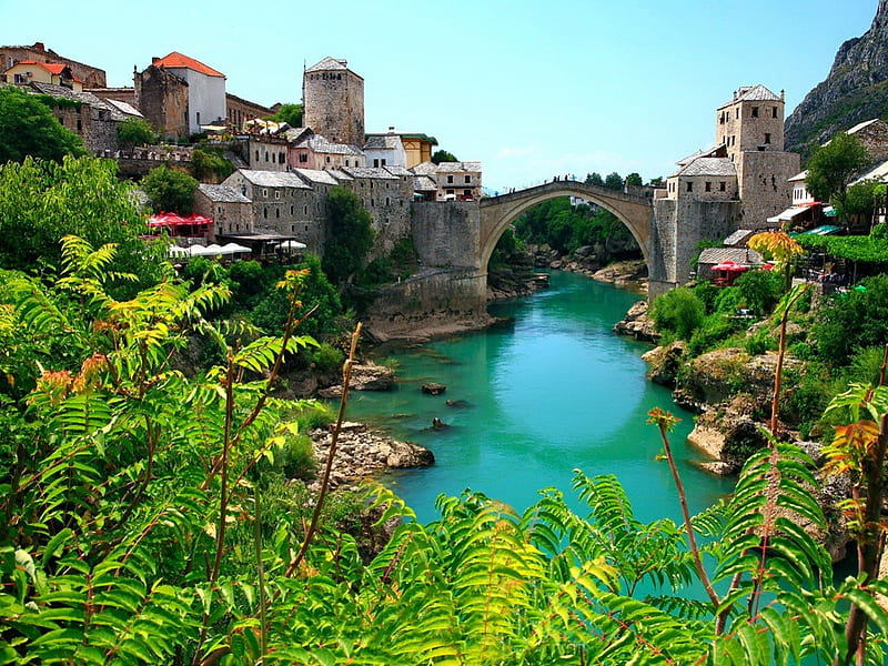 The beauties of Mostar, pretty, shore, riverbank, grass, bushes, nice, bright, village, reflection, lovely, houses, mostar, town, greenery, sky, trees, balkans, bosnia and herzegovina, inviting, sunny, bonito, europe, leaves, green, bridge, river, blue, view, clear, emerald, peaceful, summer, nature, HD wallpaper
