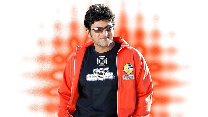 Handsome Puneeth Rajkumar Is Wearing Black T-Shirt And Red Overcoat In Blur  Background Puneeth Rajkumar, HD wallpaper | Peakpx