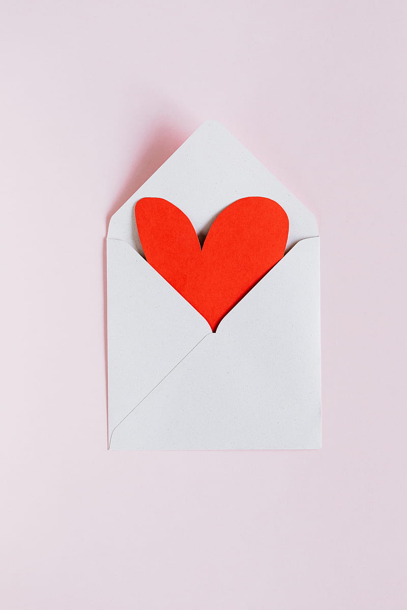 Top view of opened white envelope with handmade red paper heart placed against pink background as gift for Valentine day, HD phone wallpaper