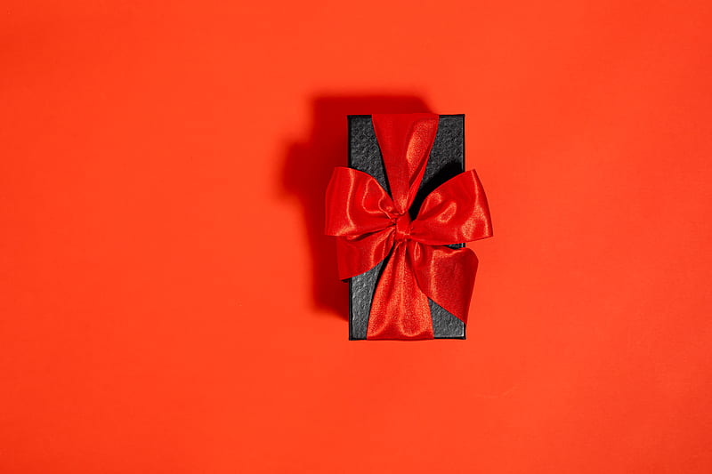 A Black Box Tied With Red Ribbon on Red Background, HD wallpaper