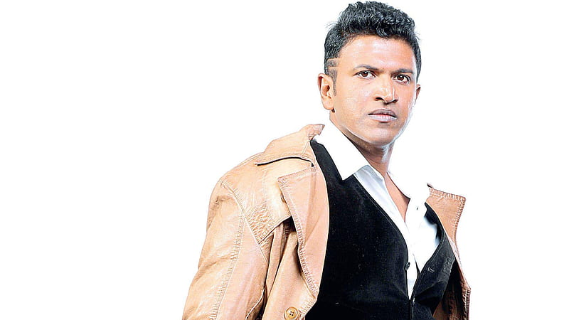 Puneeth Rajkumar Is Wearing Black White Dress And Brown Jerkin Standing In  White Background Puneeth Rajkumar, HD wallpaper | Peakpx