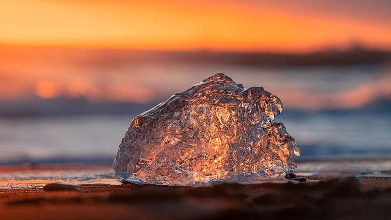 Piece of ice at the Diamond Beach in Iceland lit up by the golden light of the sun, sea, water, frozen, sunset, HD wallpaper