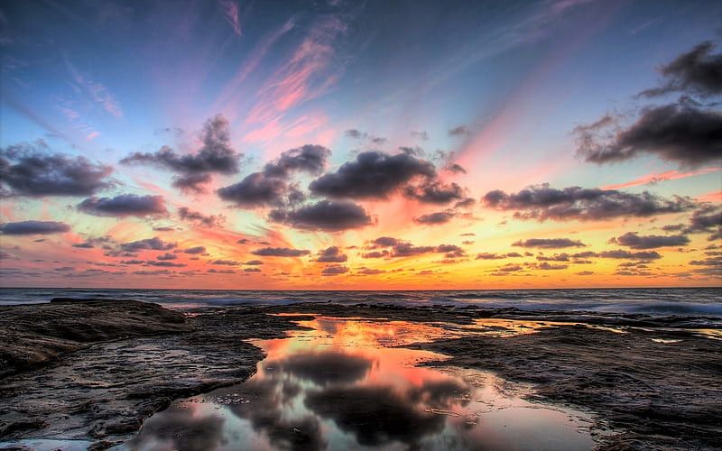 Cloudy Sun Setting Over Rocky Sea Sea Sky Clouds Oceans Rocks