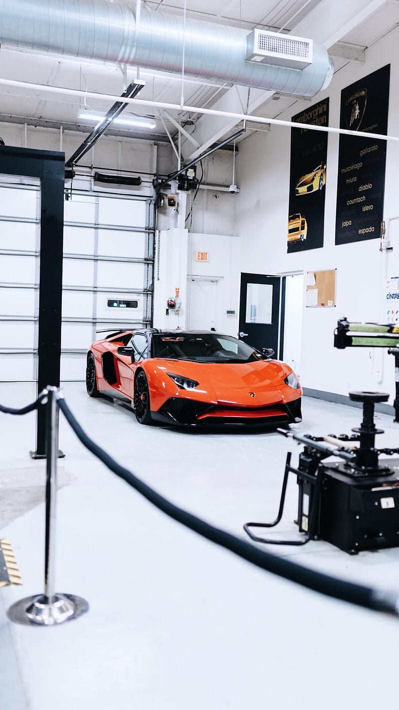 Luxury Cars inside a Garage · Free Stock Photo