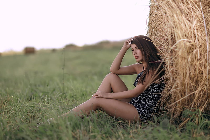 Model Posing in a Hayfield, brunette, dress, legs, model, hay, HD wallpaper