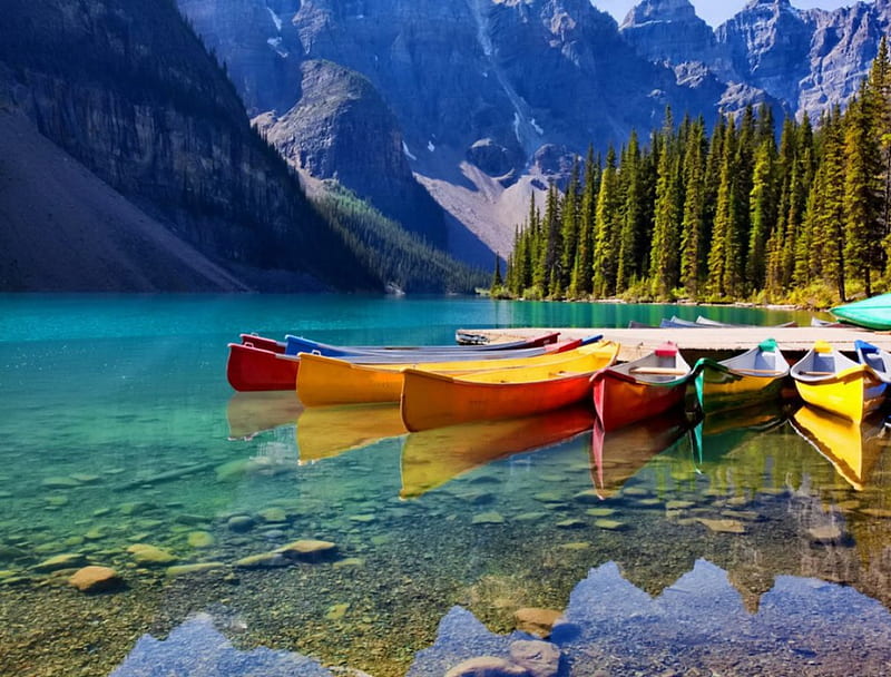 Boats with rainbow colors, colorful, riverbank, shore, slopes, sunny, canoes, bonito, rainbow, mirrored, mountain, nice, calm, boats, stones, green, bright, river, rerlection, lovely, clear, colors, emerald, trees, lake, waters, waiting, peaceful, summer, nature, walk, lakeshore, HD wallpaper