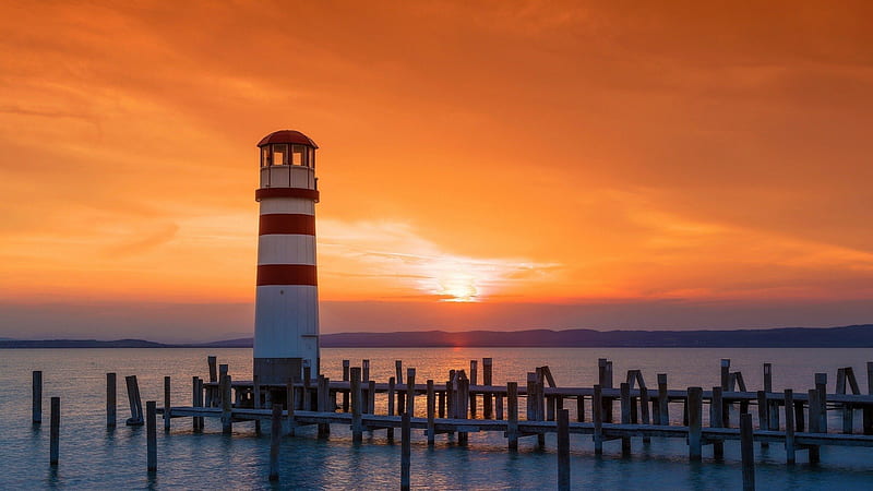 lighthouse on lake neusiedl austia at sunset, pillars, sunset, lake, lighthouse, HD wallpaper