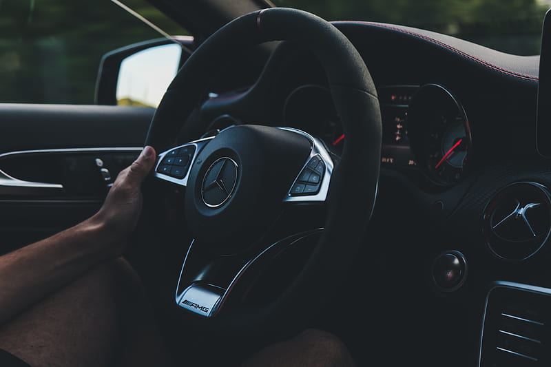 person holding on black steering wheel inside car, HD wallpaper