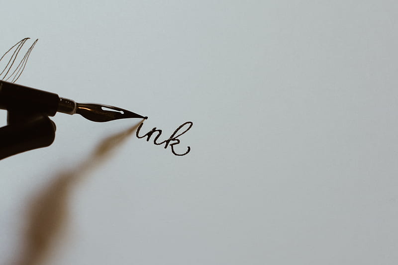 closeup graphy of person holding black fountain pen writing ink text on white paper, HD wallpaper