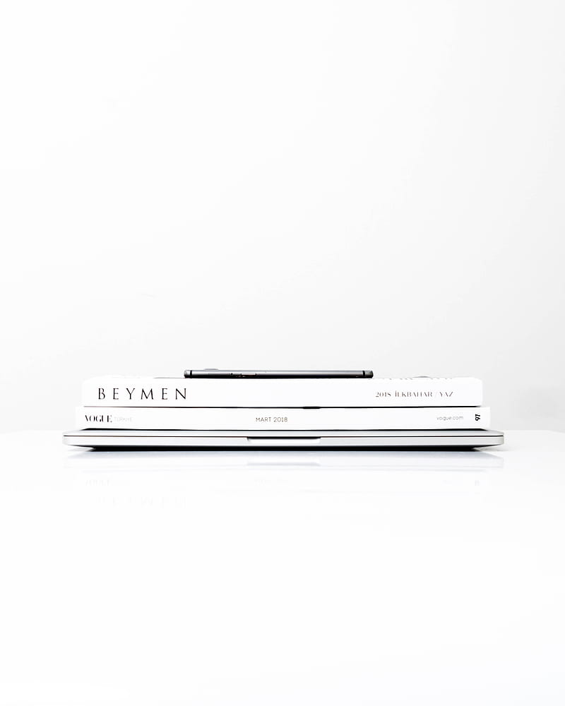 silver laptop computer with two books on the top, HD phone wallpaper