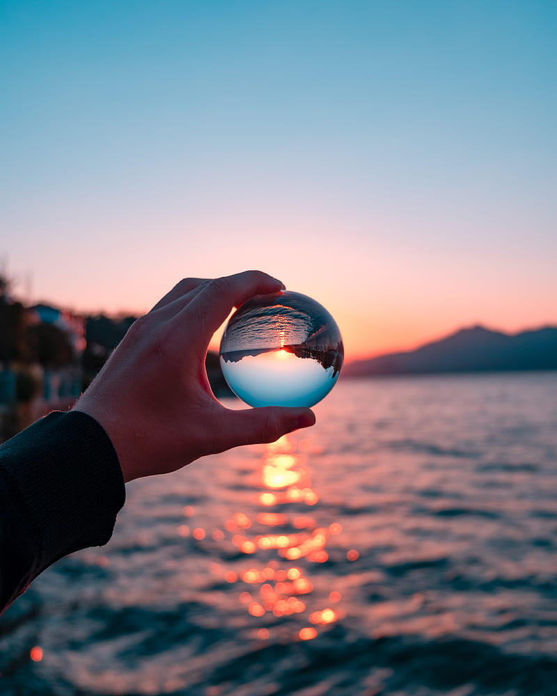 crystal ball, ball, hand, sunset, reflection, HD phone wallpaper