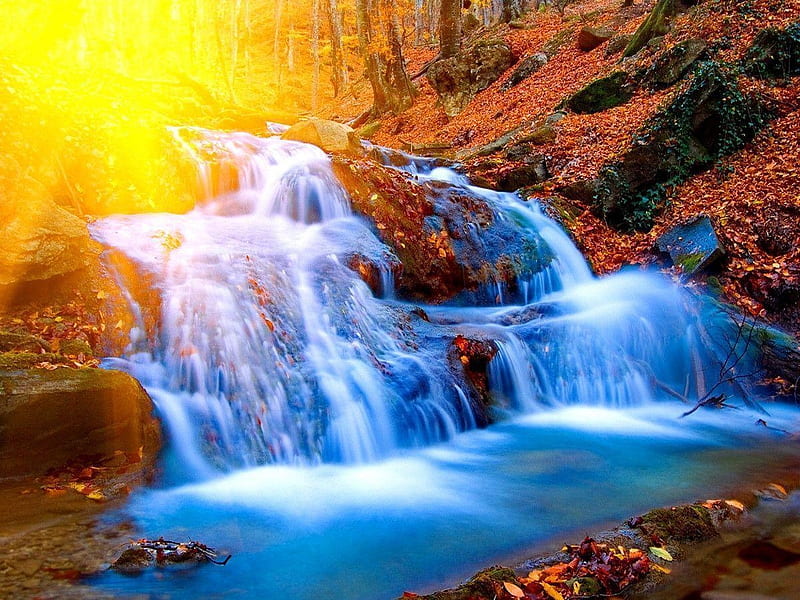 A beautiful waterfall, blue, rural, glow, sun, brown, yellow, sunny, graphy, water, waterfall, nature, forests, sunshine, HD wallpaper