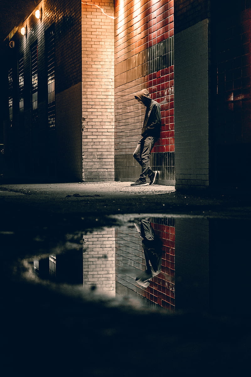 man learning on concrete wall, HD phone wallpaper