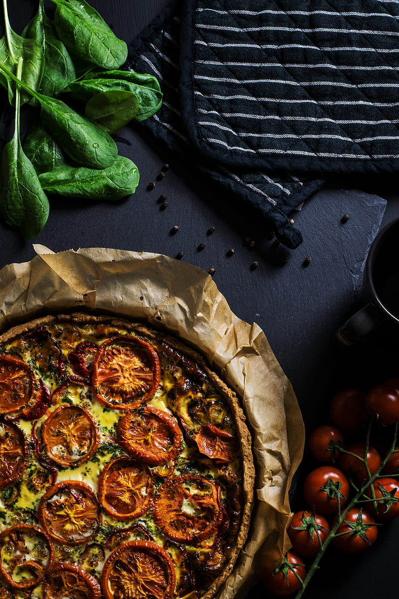 flat lay graphy of two black pot holders beside tomatoes and pizza, HD phone wallpaper