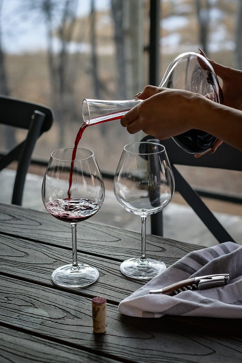 person pouring wine from decanter on wineglass, HD phone wallpaper