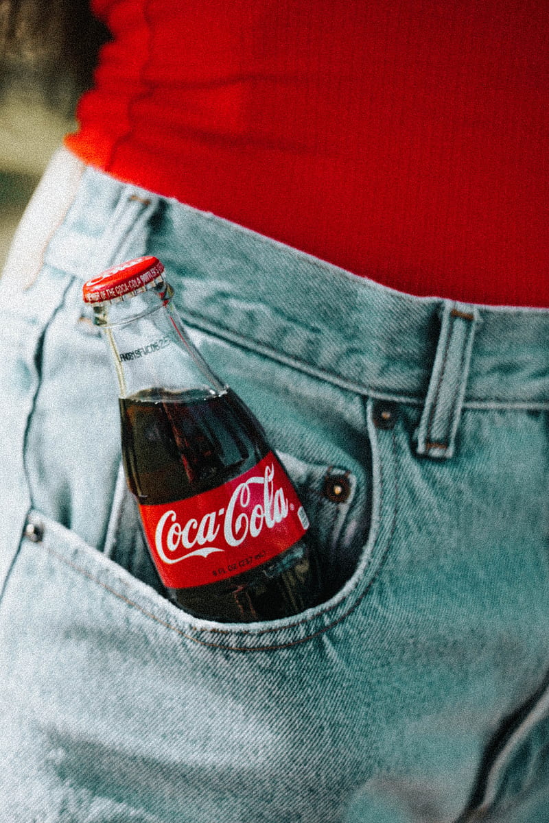 Coca-Cola glass bottle on pocket, HD phone wallpaper