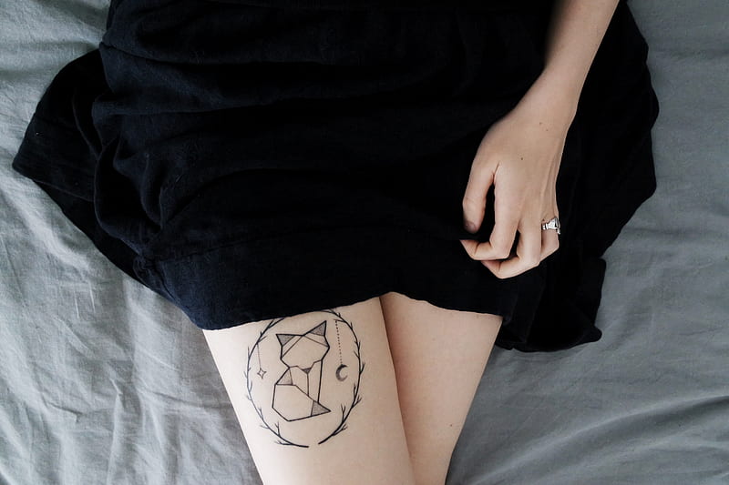 woman lying on bed sowing cat dreamcatcher tattoo on right leg during daytime, HD wallpaper