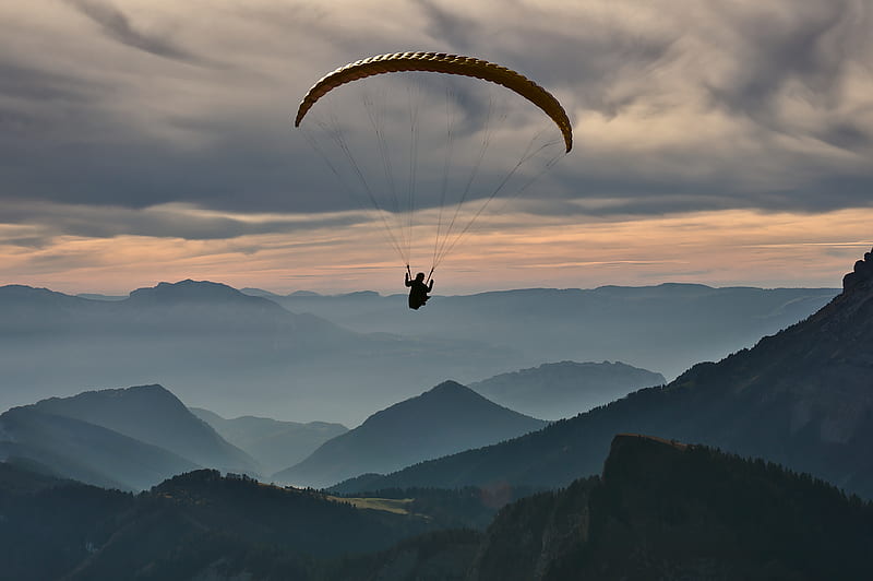 person doing paragliding under cloudy sky, HD wallpaper