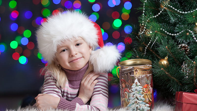 Cute Little Girl Is Wearing Colorful Sweater And Santa Claus Cap In Colorful Lights Background Cute, HD wallpaper