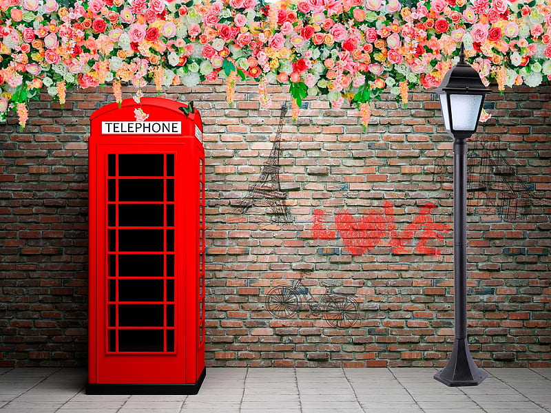 Red telephone booth at the brick wall, red, telephone, brick, flowers, booth, wall, light, roes, bonito, HD wallpaper