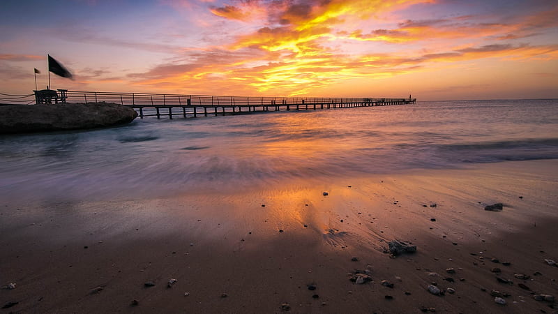 sunset over ocean pier, beach, pier, sunset, clouds, flag, sea, HD wallpaper