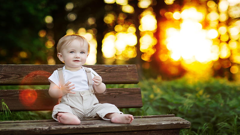 Cute Baby Boy Is Sitting On Wooden Bench Wearing White Dress In Blur Bokeh Background Cute, HD wallpaper