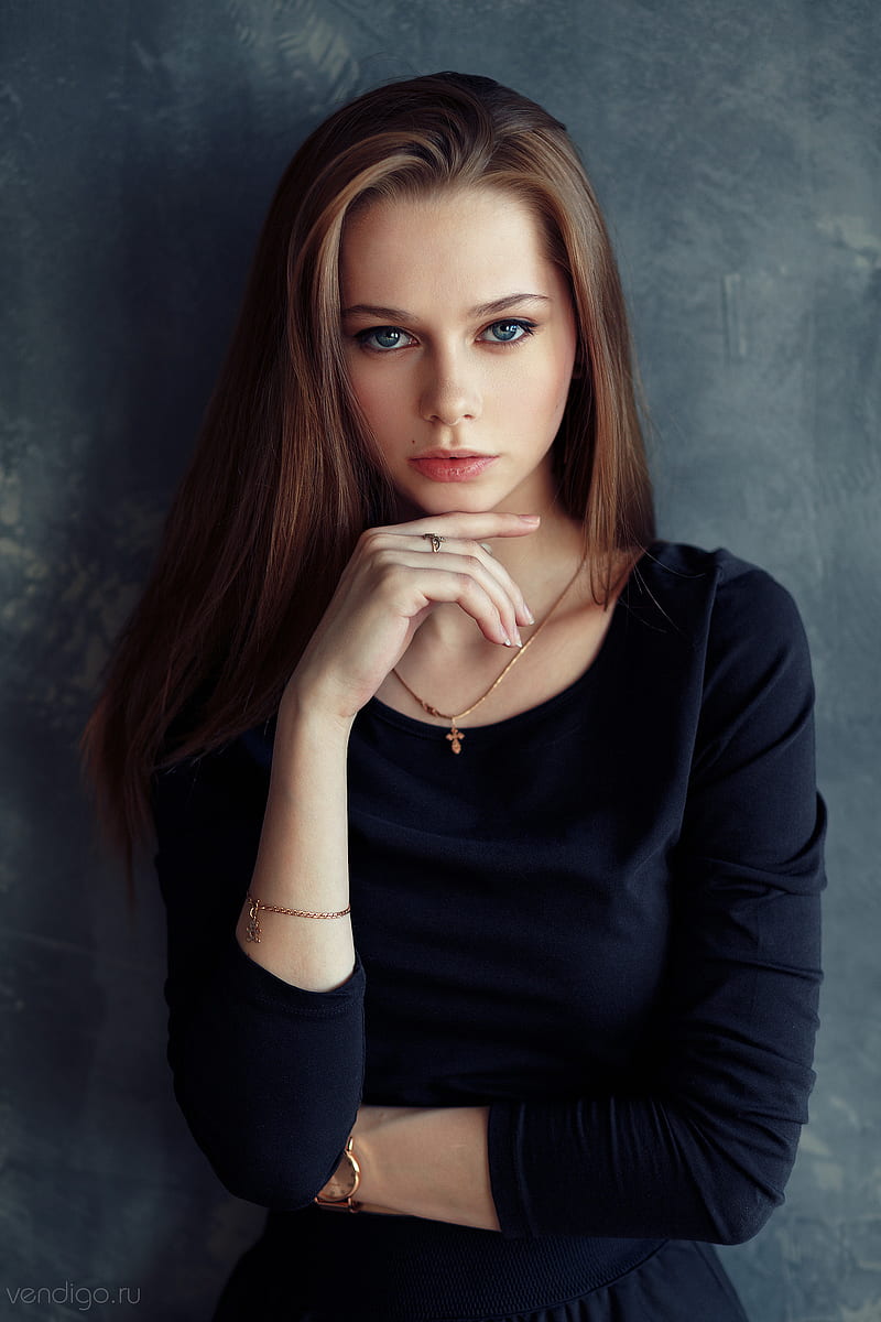 Evgeny Bulatov, women, brunette, long hair, straight hair, blue eyes, makeup, looking at viewer, dress, black clothing, jewelry, necklace, bracelets, watch, rings, wall, shadow, frontal view, HD phone wallpaper