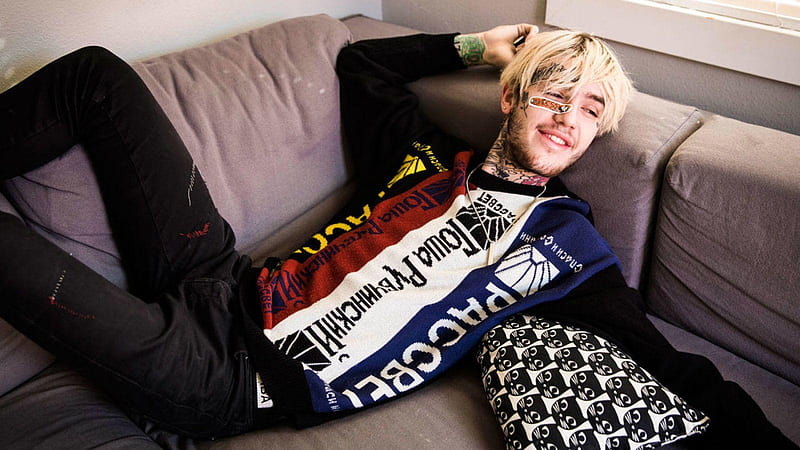lil peep is lying back on couch wearing colorful tshirt having tattoos on neck and hands music, HD wallpaper