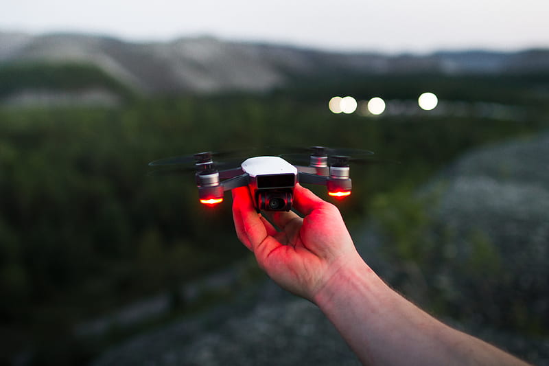 person holding black and red quadcopter, HD wallpaper